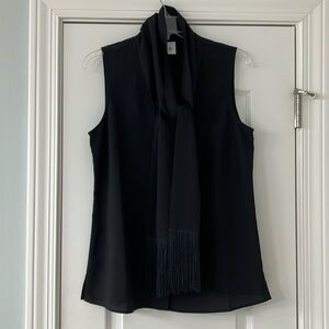 CAbi black sleeveless top with attached fringed scarf